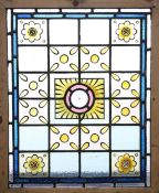 A LEADED STAINED GLASS WINDOW