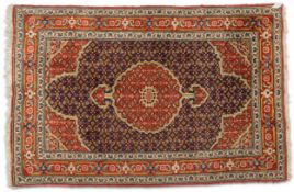 AN AFGHAN HERAT RUG