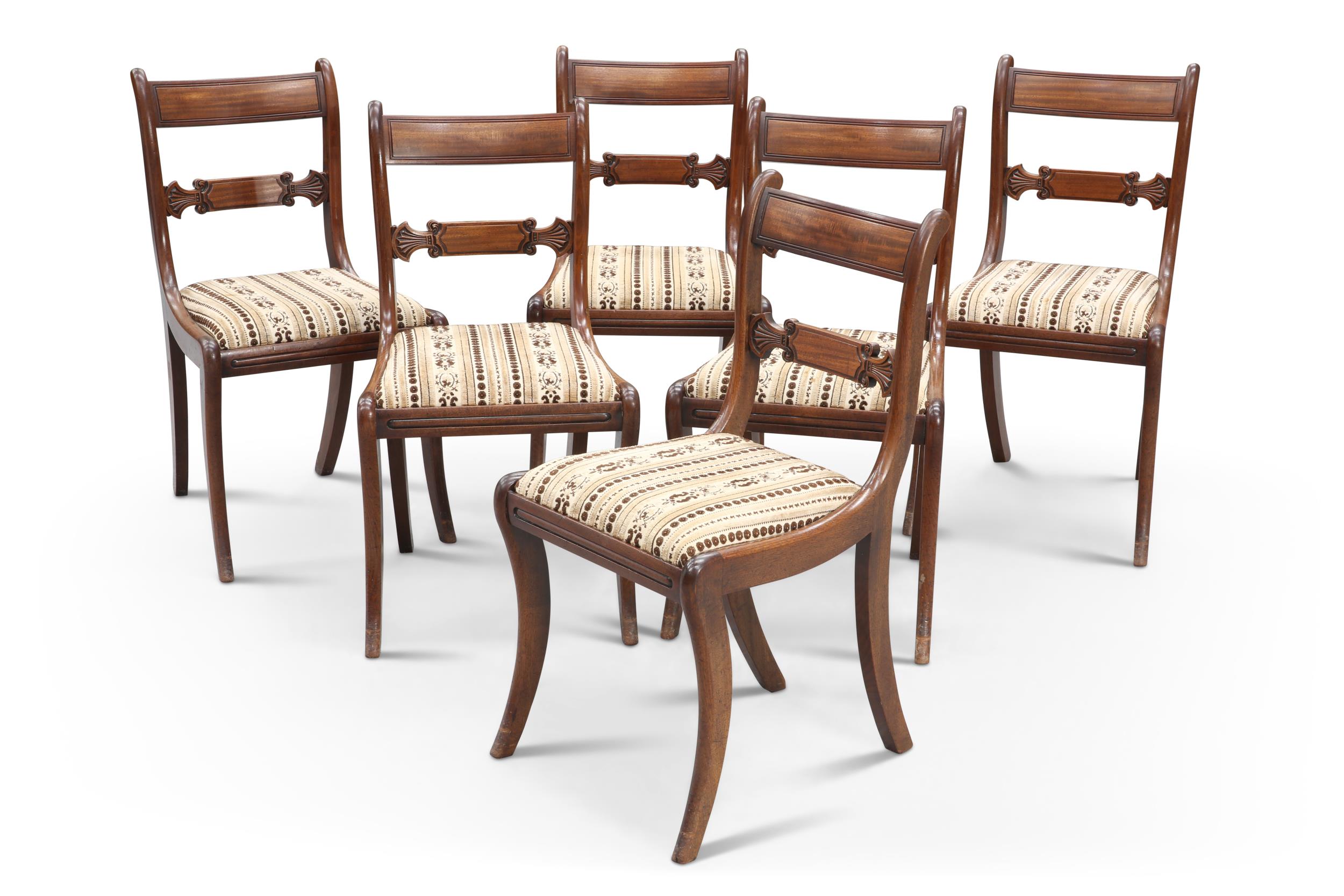 A SET OF SIX REGENCY MAHOGANY DINING CHAIRS