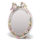 A 19TH CENTURY CONTINENTAL PORCELAIN MIRROR