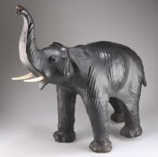 A LARGE VINTAGE LEATHER MODEL OF AN ELEPHANT