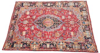 A LARGE PERSIAN KASHAN CARPET