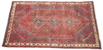 A PERSIAN KASHAN TRIBAL CARPET