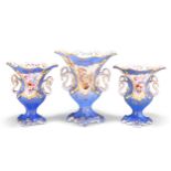 A GARNITURE OF THREE 19TH CENTURY ENGLISH PORCELAIN TWO HANDLED VASES
