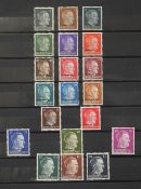 Red Stockbook German Third Reich issues mint/used in sets including Ostland, Ukraine, Sachen, Belgia