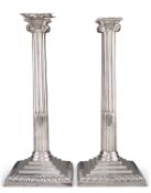 A PAIR OF GEORGE III SILVER CANDLESTICKS