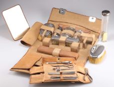 AN EDWARDIAN GENTLEMAN'S SILVER-TOPPED DRESSING TABLE SET AND MANICURE SET