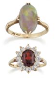 A BLACK OPAL RING, AND A 9 CARAT GOLD GARNET AND WHITE CUBIC ZIRCONIA CLUSTER RING