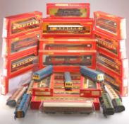 A GROUP OF TWENTY TRI-ANG AND HORNBY BOXED COACHES AND TEN UNBOXED COACHES