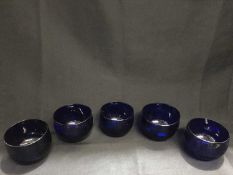 FIVE BLUE GLASS RINSERS