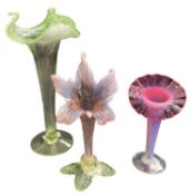 THREE LATE VICTORIAN VASELINE GLASS 'JACK IN THE PULPIT' VASES