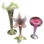 THREE LATE VICTORIAN VASELINE GLASS 'JACK IN THE PULPIT' VASES