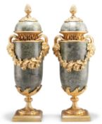 A PAIR OF LOUIS XVI STYLE GILT-METAL MOUNTED GREEN MARBLE CASSOLETTES