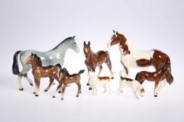 A BESWICK PINTO PONY, TWO FOALS, TWO HOUNDS, ETC.