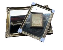 TWO GILT-FRAMED MIRRORS AND A PRINT OF A SAMPLER
