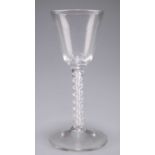 AN 18TH CENTURY AIR TWIST WINE GLASS