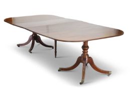 A REGENCY MAHOGANY TWIN-PEDESTAL DINING TABLE