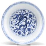 A CHINESE BLUE AND WHITE 'DRAGON' DISH