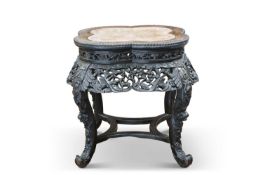 A CHINESE MARBLE-INSET HARDWOOD JARDINIÈRE STAND, CIRCA 1900