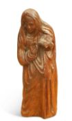 A 19TH CENTURY OAK CARVING OF A SAINT