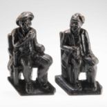 A PAIR OF VICTORIAN CAST IRON DOORSTOPS