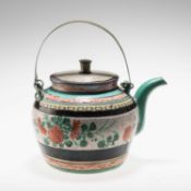 A CHINESE STONEWARE TEA KETTLE