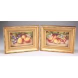 A PAIR OF ROYAL WORCESTER STYLE FRUIT-PAINTED PORCELAIN PLAQUES