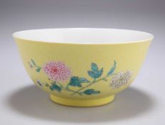 A CHINESE 'CARVED' YELLOW GROUND BOWL