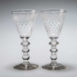 A PAIR OF WINE GLASSES