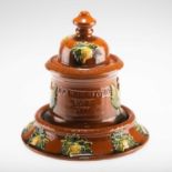 YORK INTEREST: A VICTORIAN GLAZED TERRACOTTA TOBACCO JAR