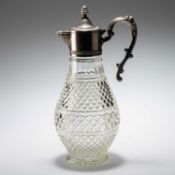 A SILVER-PLATE MOUNTED CLARET JUG