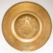 A LARGE BRASS ALMS PLATE