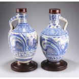 A PAIR OF LATE 19TH / EARLY 20TH CENTURY BLUE AND WHITE DELFT TIN GLAZE JARS