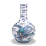 A CHINESE DOUCAI 'DRAGON' BOTTLE VASE