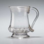 AN 18TH CENTURY GLASS MUG