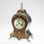 A 19TH CENTURY FRENCH BOULLE MANTEL CLOCK
