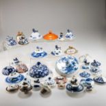 A COLLECTION OF CHINESE VASE LIDS