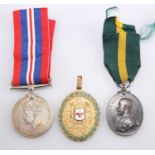 A TRIO OF MEDALS, 20TH CENTURY