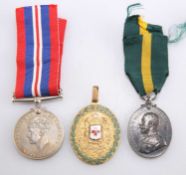 A TRIO OF MEDALS, 20TH CENTURY
