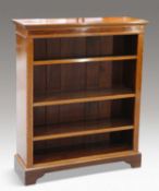 AN EDWARDIAN INLAID MAHOGANY OPEN BOOKCASE, LABELLED HARRODS