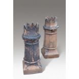 A PAIR OF VICTORIAN CROWN TOP TERRACOTTA CHIMNEY POTS
