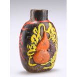 A CHINESE CARVED AND PAINTED STONE SNUFF BOTTLE, 19TH CENTURY