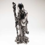 A CHINESE HARDWOOD FIGURAL CARVING OF SHAO LAO