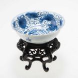 A CHINSE MING DYNASTY BLUE AND WHITE SHALLOW BOWL