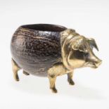 A 19TH CENTURY BRASS-MOUNTED COCONUT PIG