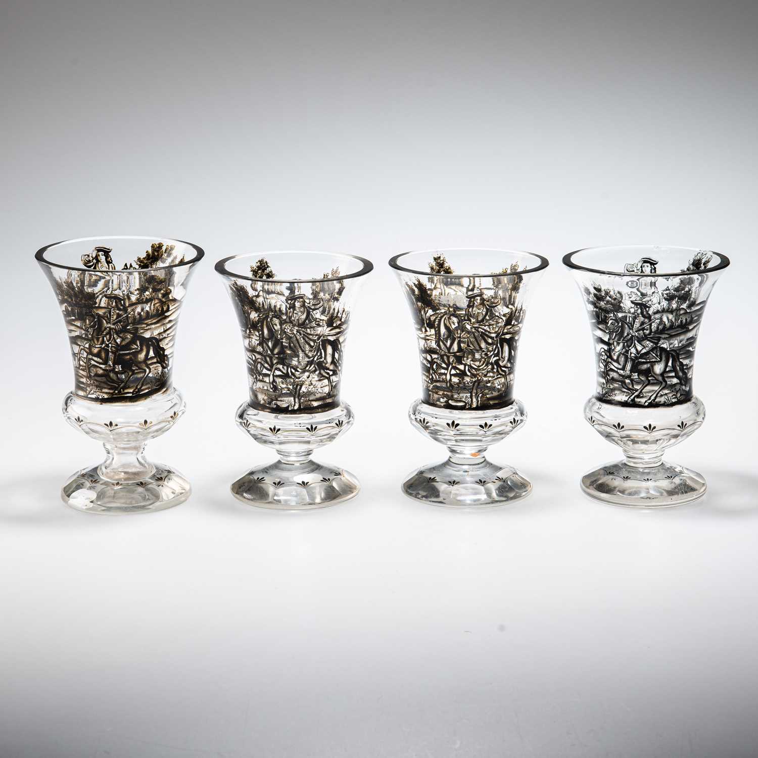 ATTRIBUTED TO JOSEF LENHARDT OF STEINSCHÖNAU, FOUR SCHWARZLOT GLASS GOBLETS