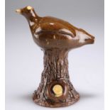 AN EARLY 19TH CENTURY SLIPWARE BIRD WHISTLE