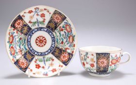 A WORCESTER 'KAKIEMON' CUP AND SAUCER, CIRCA 1775