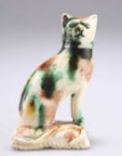 A WHIELDON-TYPE POTTERY MODEL OF A SEATED CAT