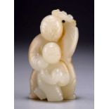 A CARVED JADE FIGURAL GROUP